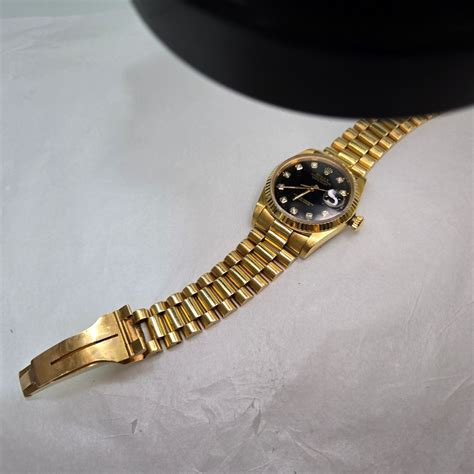 rolex au750